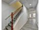 Basement showing a carpeted staircase and vinyl flooring at 2075 Pine Tree Dr # A4, Buford, GA 30518