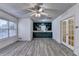 Finished basement recreation room with built-in bar and hardwood floors at 2075 Pine Tree Dr # A4, Buford, GA 30518