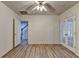 Finished basement room with French doors and hardwood floors at 2075 Pine Tree Dr # A4, Buford, GA 30518