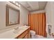Basement bathroom with a shower/tub combo and updated vanity at 2075 Pine Tree Dr # A4, Buford, GA 30518