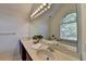 Bathroom boasts double sinks, a large mirror, and a garden tub at 2075 Pine Tree Dr # A4, Buford, GA 30518