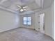 Spacious bedroom with high ceilings and a ceiling fan at 2075 Pine Tree Dr # A4, Buford, GA 30518