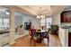 Bright dining room with hardwood floors and chandelier at 2075 Pine Tree Dr # A4, Buford, GA 30518