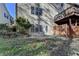 Townhouse exterior with deck and fenced patio area at 2075 Pine Tree Dr # A4, Buford, GA 30518