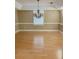 Formal dining room with hardwood floors and a chandelier at 3550 Bay Creek Church Rd, Loganville, GA 30052