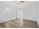 Main bedroom with private bathroom access and luxury vinyl plank flooring at 5950 Milligan Ct, Atlanta, GA 30349