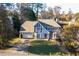 Aerial view of two story house with attached garage and driveway at 1514 Yorktown Dr, Lawrenceville, GA 30043