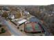 Aerial view of community tennis courts, playground and covered area at 1514 Yorktown Dr, Lawrenceville, GA 30043