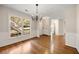 Hardwood floors and wainscoting accent this bright dining room at 2601 Vineyard Se Way, Smyrna, GA 30082