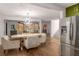 Bright dining area with hardwood floors and a large chandelier at 1208 Laurel Cliff Se Dr, Smyrna, GA 30082