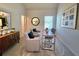 Home office with two plush chairs, a wooden desk, and stylish wall art at 3964 Riverchess Lot 157 Dr, Atlanta, GA 30331