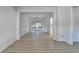 Bright dining room features hardwood floors, chandelier, and wainscoting at 145 Gainford Ct, Duluth, GA 30097