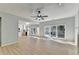 Living room with hardwood floors and kitchen view at 145 Gainford Ct, Duluth, GA 30097