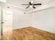 Spacious basement bedroom with hardwood floors and ceiling fan at 580 Hutchens Se Rd, Atlanta, GA 30354