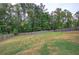 Large fenced backyard with spacious grassy area at 138 Gorham Gates Dr, Hiram, GA 30141