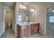 Double vanity bathroom with access to a small toilet room at 138 Gorham Gates Dr, Hiram, GA 30141