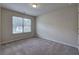 Simple bedroom with neutral walls and carpet at 138 Gorham Gates Dr, Hiram, GA 30141
