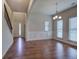 Bright dining room with hardwood floors and view of the foyer at 138 Gorham Gates Dr, Hiram, GA 30141