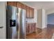 Modern kitchen with stainless steel appliances and hardwood floors at 138 Gorham Gates Dr, Hiram, GA 30141