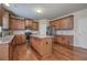 Modern kitchen with granite countertops and wood cabinetry at 138 Gorham Gates Dr, Hiram, GA 30141