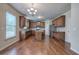 Kitchen features hardwood floors, an island, and ample cabinetry at 138 Gorham Gates Dr, Hiram, GA 30141