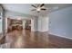 Hardwood floor living room with an open floor plan and kitchen access at 138 Gorham Gates Dr, Hiram, GA 30141