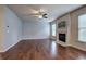 Spacious living room with hardwood floors and fireplace at 138 Gorham Gates Dr, Hiram, GA 30141