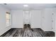 Spacious hallway featuring light walls and wood-look flooring at 7351 Poppy Way, Union City, GA 30291