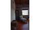 Bedroom with exposed brick and hardwood floors at 490 Marietta St # 307, Atlanta, GA 30313