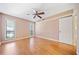 Spacious main bedroom with hardwood floors and ceiling fan at 4065 Woodridge Way, Tucker, GA 30084