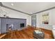 Living room featuring hardwood floors, fireplace, and a cozy atmosphere at 79 Rogers Se St, Atlanta, GA 30317