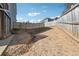 Large backyard with wooden fence at 2599 Windsor Knoll Dr, Dacula, GA 30019