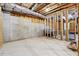 Unfinished basement with high ceilings and potential for expansion at 2599 Windsor Knoll Dr, Dacula, GA 30019