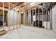 Unfinished basement with plumbing and electrical work roughed in at 2599 Windsor Knoll Dr, Dacula, GA 30019