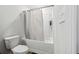 Simple bathroom with shower/tub combo and white fixtures at 2599 Windsor Knoll Dr, Dacula, GA 30019