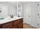 Well-lit bathroom with a single sink vanity at 2599 Windsor Knoll Dr, Dacula, GA 30019