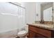 Clean bathroom with granite vanity and shower/tub combo at 2599 Windsor Knoll Dr, Dacula, GA 30019