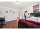 Comfortable bedroom with hardwood floors and a walk-in closet at 2599 Windsor Knoll Dr, Dacula, GA 30019