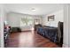 Bright bedroom with wood floors and built-in desk at 2599 Windsor Knoll Dr, Dacula, GA 30019