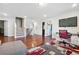 Open bonus room with hardwood floors and a staircase at 2599 Windsor Knoll Dr, Dacula, GA 30019