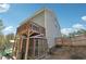 Two-story house with deck, dog run, and fenced yard at 2599 Windsor Knoll Dr, Dacula, GA 30019