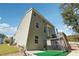 Two story house exterior with deck and dog kennel at 2599 Windsor Knoll Dr, Dacula, GA 30019