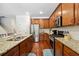 Modern kitchen with granite countertops and stainless steel appliances at 2599 Windsor Knoll Dr, Dacula, GA 30019