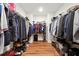 Large walk-in closet with ample shelving and hanging space at 2599 Windsor Knoll Dr, Dacula, GA 30019