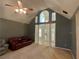 Open living room with high ceilings and view to foyer at 5393 S Crest Ridge Dr, Ellenwood, GA 30294