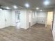 Finished basement with hardwood floors and multiple rooms at 1445 Watercrest Cir, Lawrenceville, GA 30043