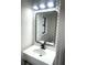 Updated bathroom with hexagon tile and a modern vanity at 1445 Watercrest Cir, Lawrenceville, GA 30043