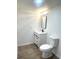 Basement bathroom with modern vanity and toilet at 1445 Watercrest Cir, Lawrenceville, GA 30043