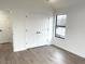 Spacious bedroom with hardwood floors and double doors at 1445 Watercrest Cir, Lawrenceville, GA 30043