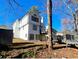Rear view of house showing deck and additional storage at 1445 Watercrest Cir, Lawrenceville, GA 30043
